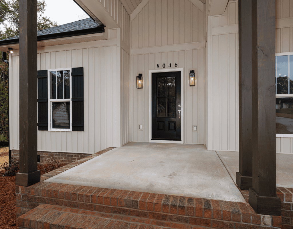 Beautiful custom-built deck with wooden flooring and screened enclosure, designed by Alexander Realty and Construction LLC in York County, SC.